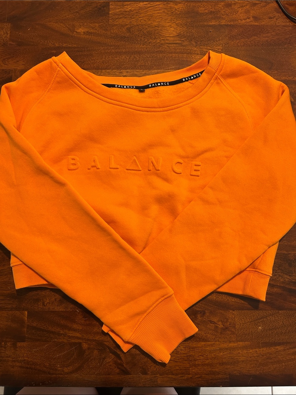 Balance Athletica Orange Embossed Logo Cropped Crewneck Sweatshirt